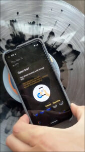 Users can tap their smartphones against the tag to uniquely identify and authenticate a record in the blockchain.