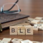 the acronym ble for Bluetooth Low Energy concept represented by wooden letter tiles