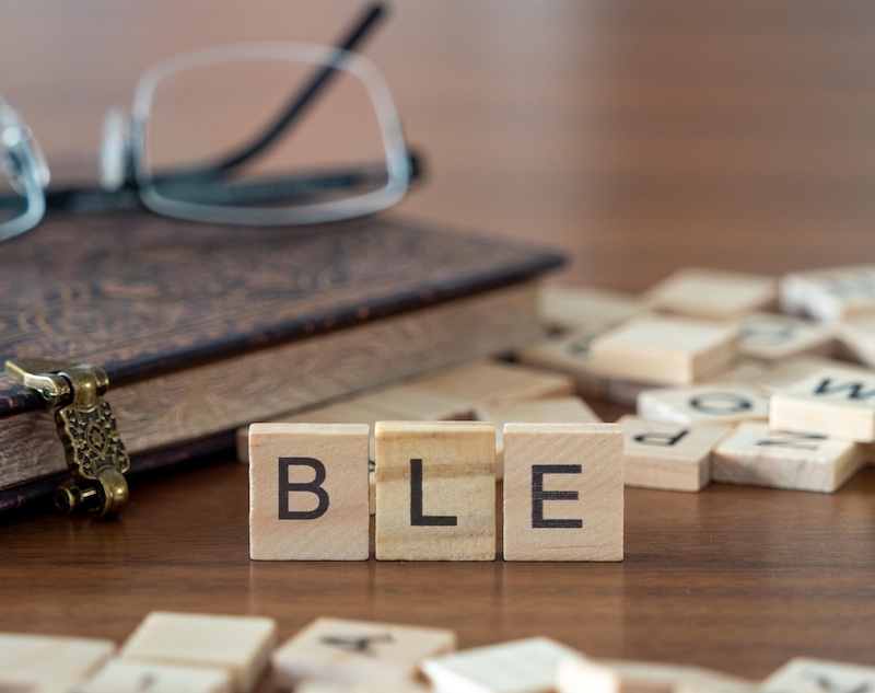 the acronym ble for Bluetooth Low Energy concept represented by wooden letter tiles
