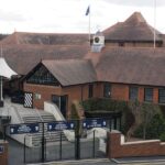 Chester. Cheshire, United Kingdom - 20 March 2024 : The entrance gates to Chester racecourse and 1539 roof terrace