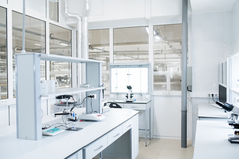 Interior of empty science laboratory with modern equipment, copy space