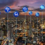 Eseys IoT Q&A Internet of thing or iot variouse icon over the Fantastic Scene of Panorama of Bangkok cityscape which have Modern building and river side from latest highest building, Technology smart city concept