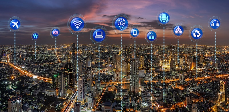 Eseys IoT Q&A Internet of thing or iot variouse icon over the Fantastic Scene of Panorama of Bangkok cityscape which have Modern building and river side from latest highest building, Technology smart city concept