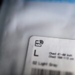 RFID acronym of Radio-frequency identification sticker tag etiquette on the clothes packaging